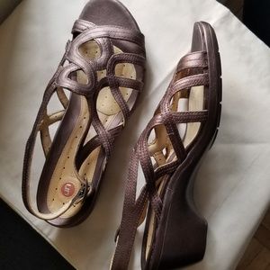 Clark's bronze metallic leather wedge sandals.